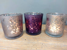 Load image into Gallery viewer, Festive Set of Three Beautiful Embossed Festive Snowflake Pink, Purple and Blush Tealight Holders
